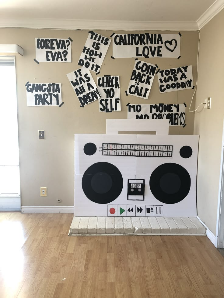 an old school boombox is decorated with black and white letters that read california love