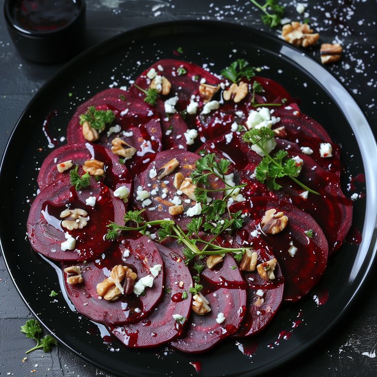 beet salad with walnuts and feta cheese on a black plate