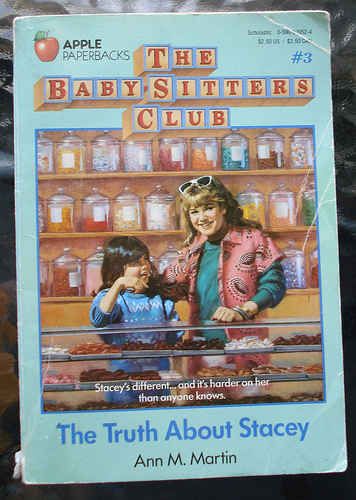 the babysitters club book cover with two girls in front of shelves full of jars