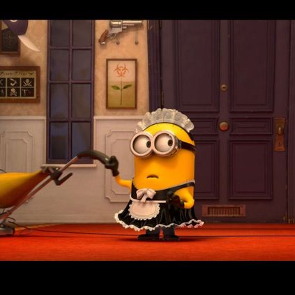 a minion in a dress is standing next to a baby carriage