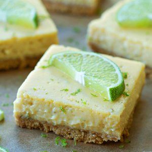 lime cheesecake bars are sitting on a baking sheet