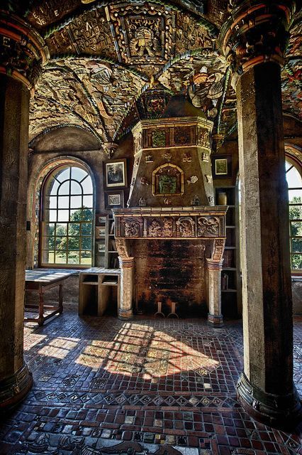 the interior of an old building with brick floors and arches