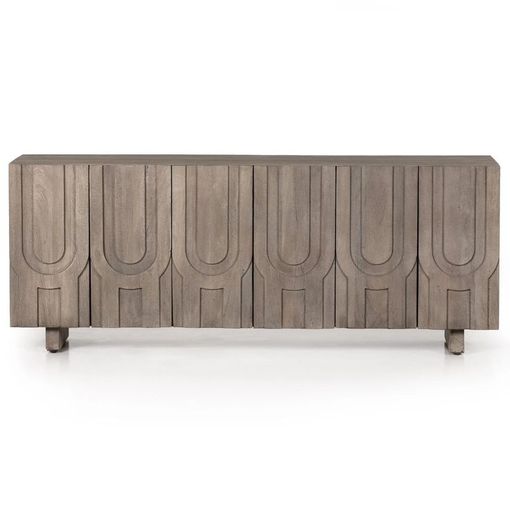 the sideboard is made out of wood and has an unusual design on it's sides