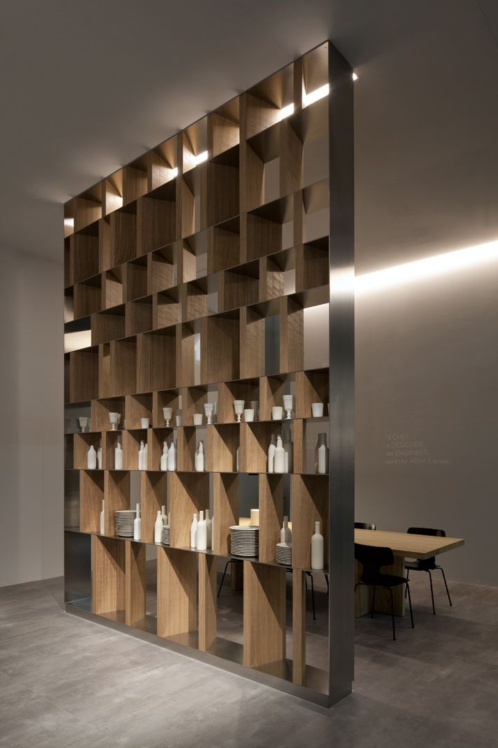 a room that has some shelves on the wall