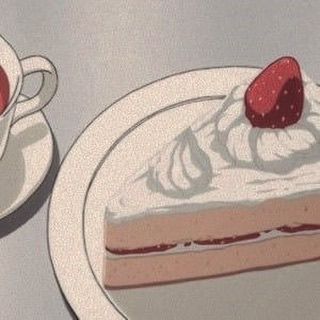 a piece of cake on a plate with a cup of coffee and saucer next to it