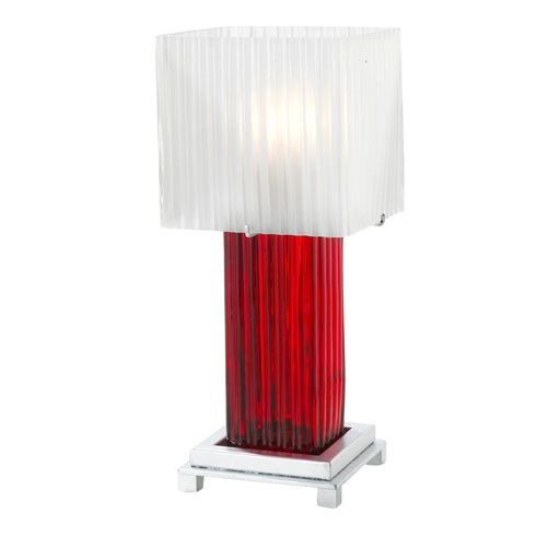 a red and white table lamp with a square shade on the top, sitting on a metal stand