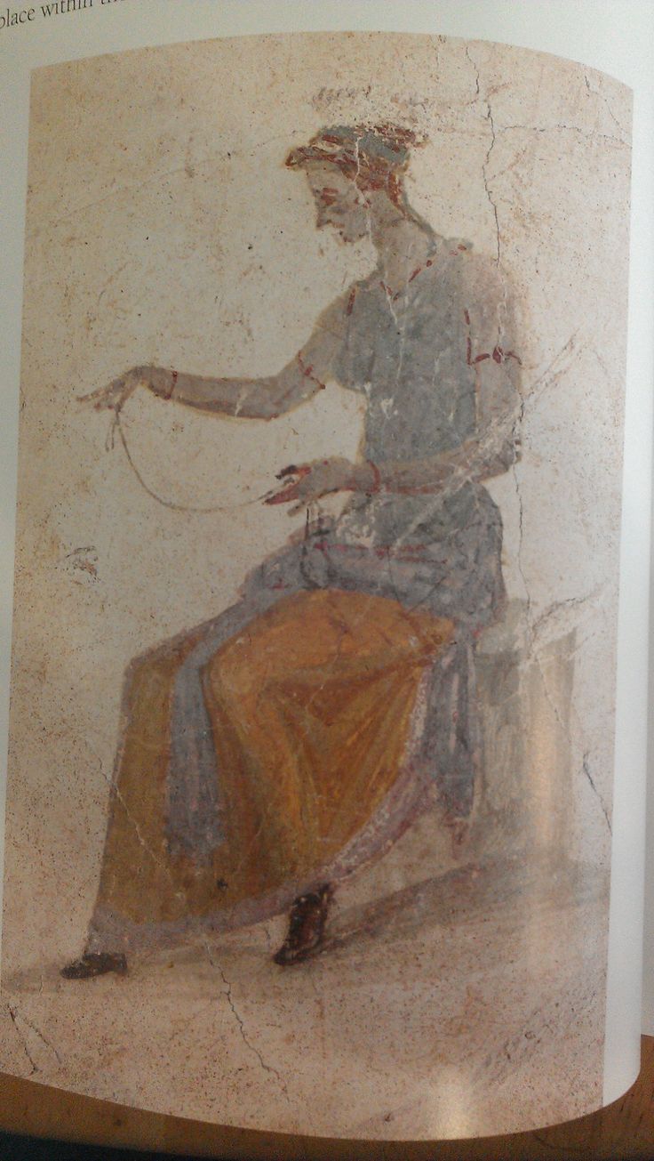 an ancient painting on display in a museum