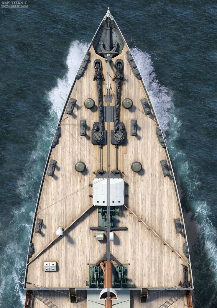 an aerial view of a boat in the water