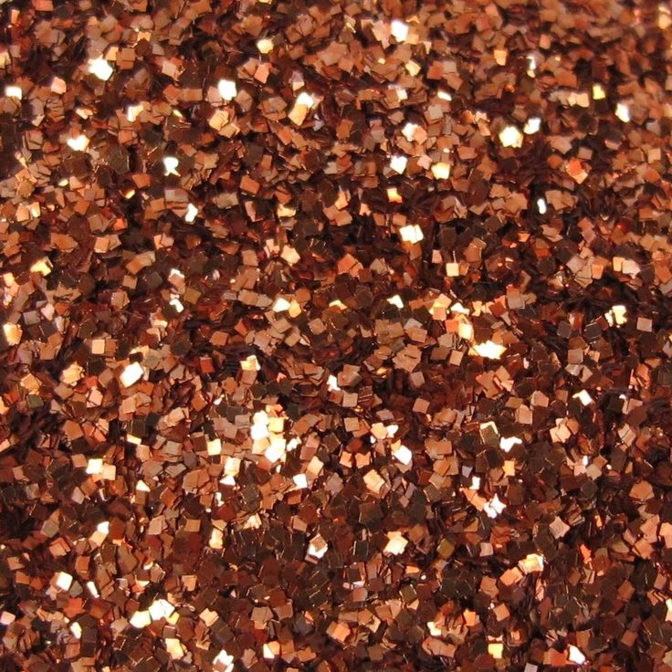 a pile of brown and white glitter next to each other