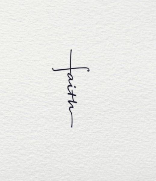 the word faith written in cursive writing on white paper with a black ink pen