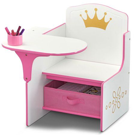 a child's desk with a pink drawer underneath it and a gold crown on the top