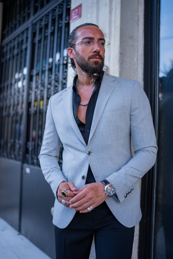 Elevate your winter wardrobe with the HolloMen Silver Mist Gray jacket. This sleek and versatile jacket is perfect for layering over sweaters and hoodies, adding a touch of modern sophistication to any casual outfit.