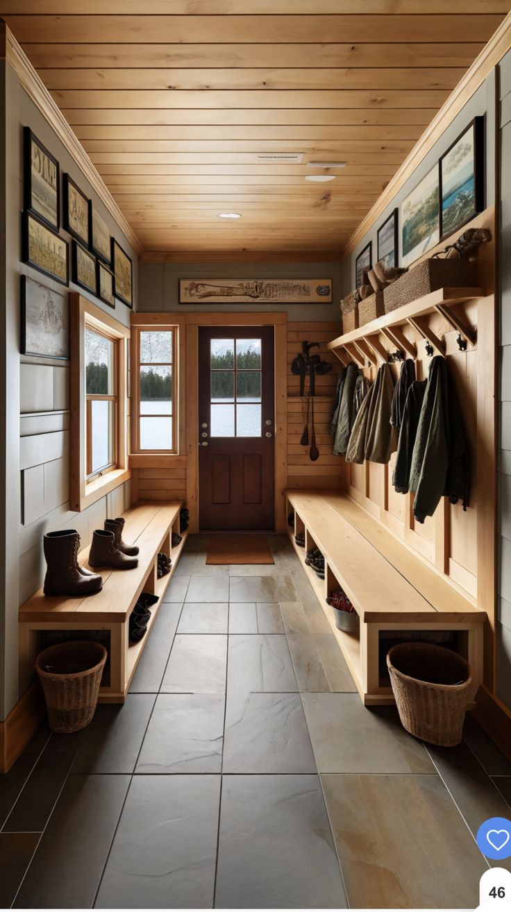 a long wooden bench sitting next to a doorway