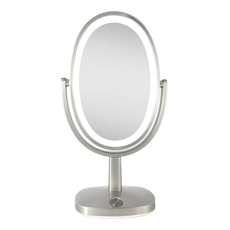 a silver stand with a mirror on the top and one light on it's side