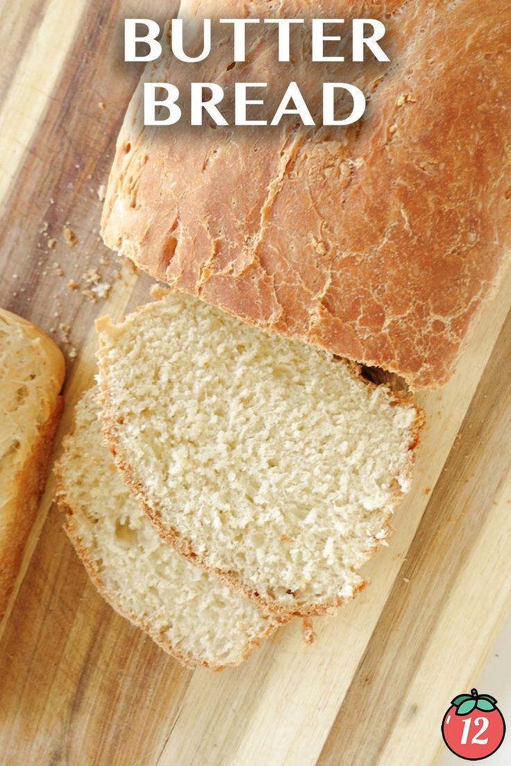 a loaf of bread sitting on top of a wooden cutting board