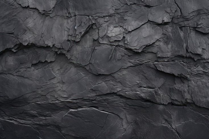 an image of a rock wall that looks like it has been painted black