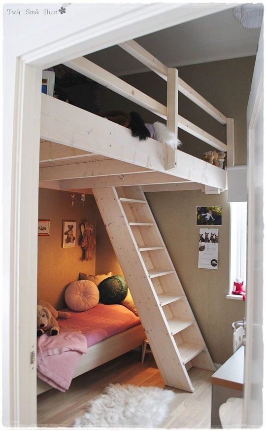 there is a loft bed with stairs in the room