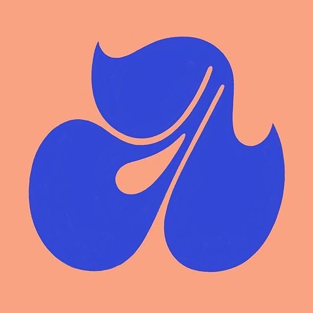 a blue flower on an orange background with the word love written below it in bold font