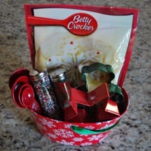 a red basket filled with lots of different types of cookies and other things in it