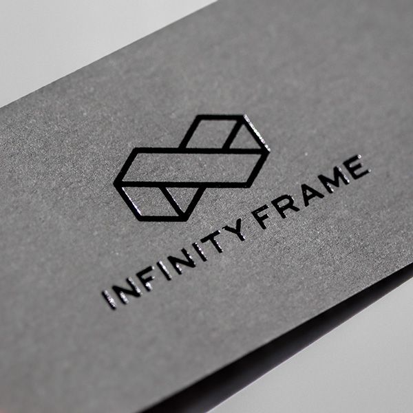 a business card with the word infinity frame on it