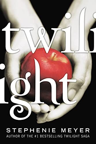 two hands holding an apple in front of a black background with the words twilight on it