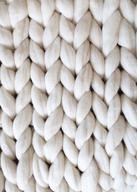 a pile of white wool is shown close up