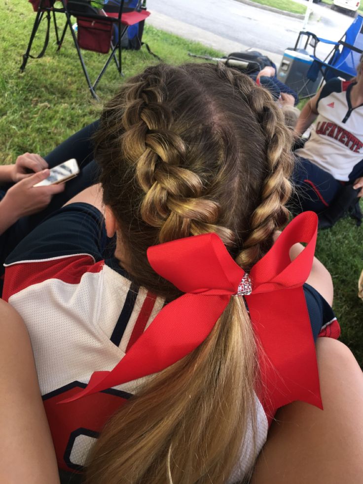 Two dutch braids meet into a pony tail Braided Cheer Hair, Cute Cheer Hairstyles With Bow, Cute Cheer Hairstyles, Cheer Ponytail, Soccer Hairstyles, Volleyball Hair, Tail Hairstyle, Run Club, Gymnastics Hair