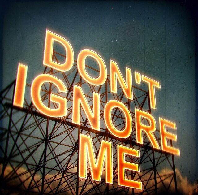 a neon sign that says don't ignore me