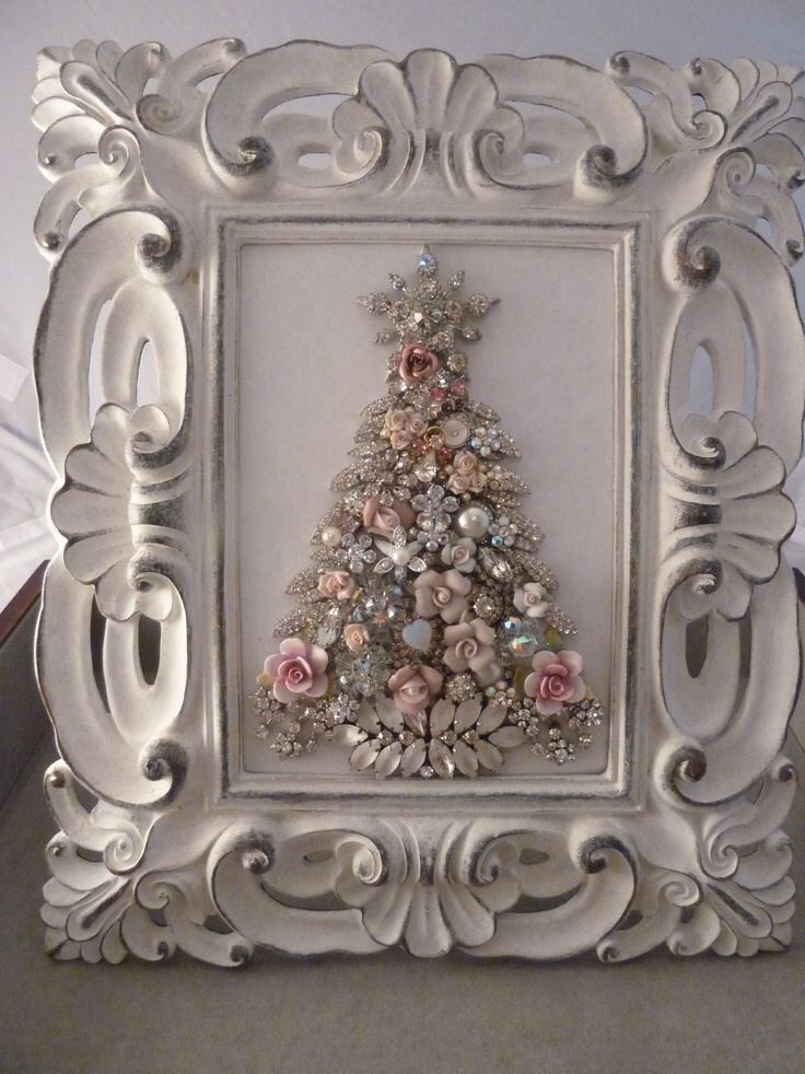 a white frame with a christmas tree in it