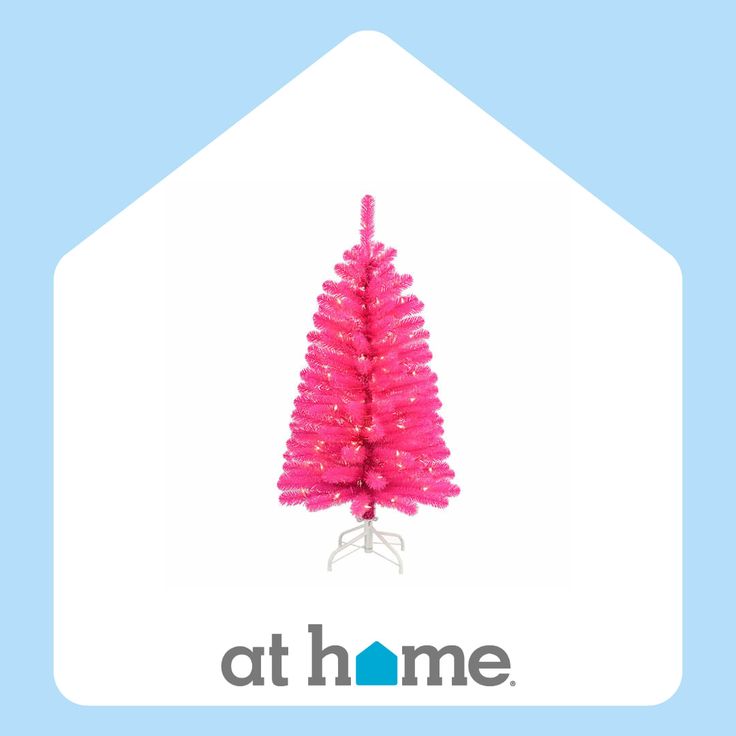 a pink christmas tree is in the shape of a house with words at home on it