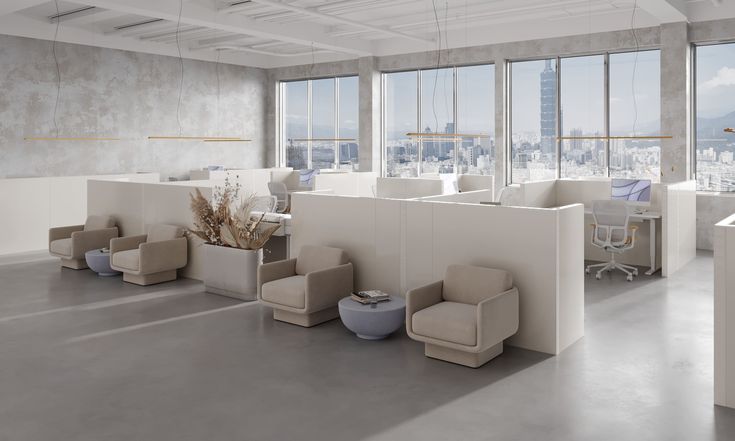 an empty office with chairs and desks in front of large windows overlooking the city