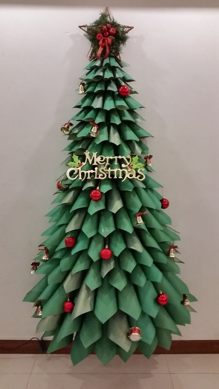 a christmas tree made out of folded origami