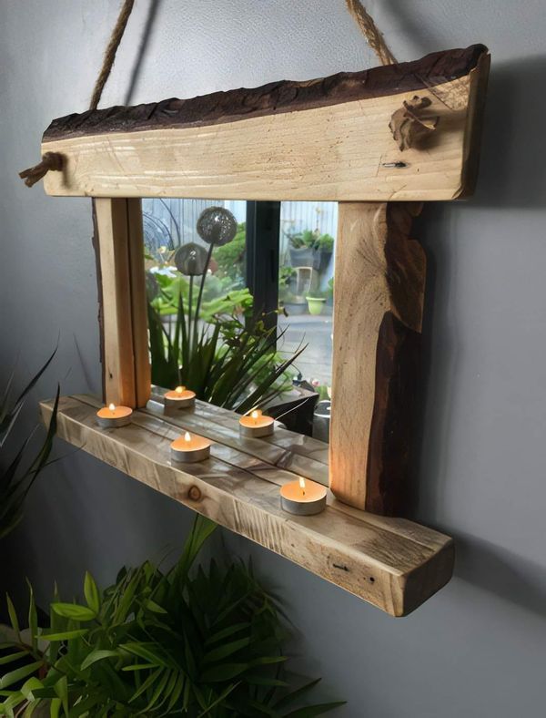 a wooden shelf with candles hanging from it