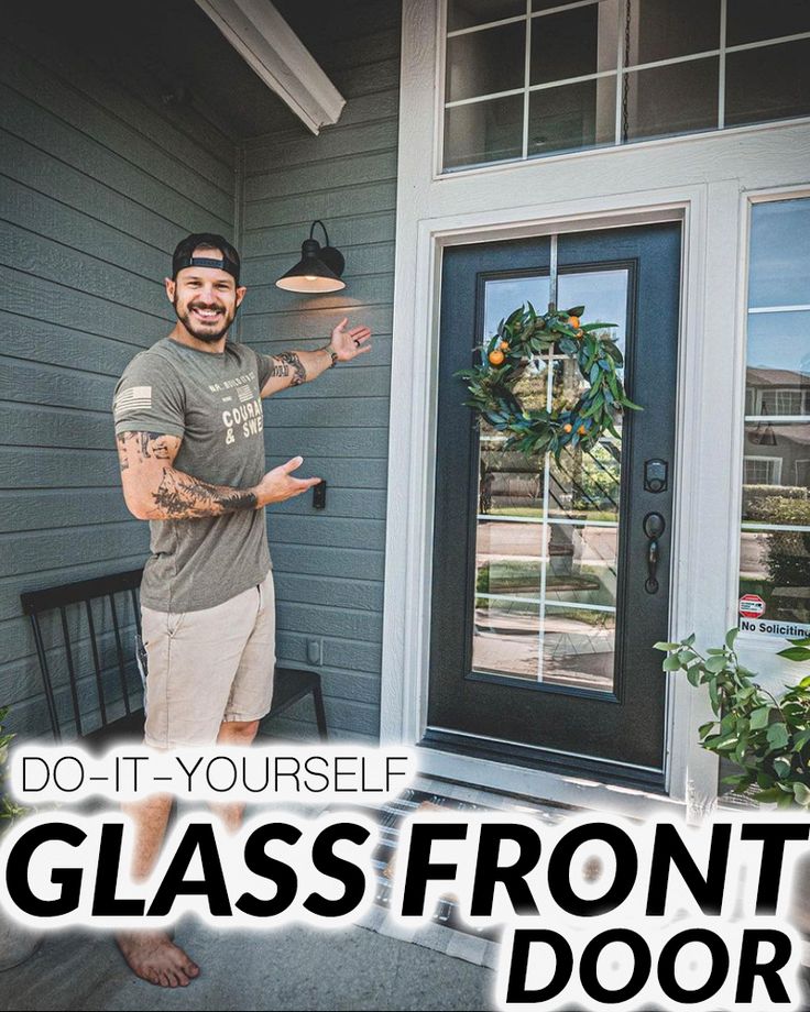 a man standing in front of a door with the words do - it - yourself glass front door