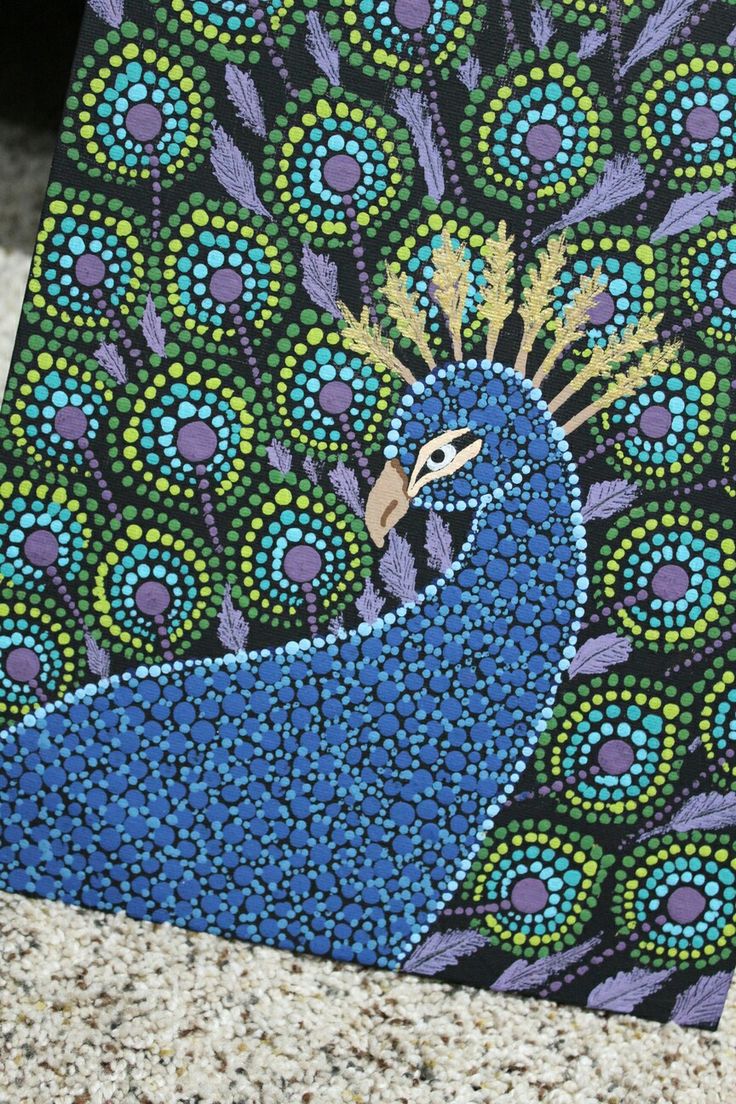 a painting of a blue peacock on a black and purple background with circles around it