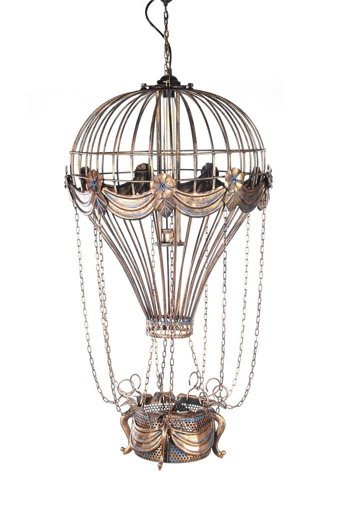 an ornate birdcage chandelier is hanging from the ceiling