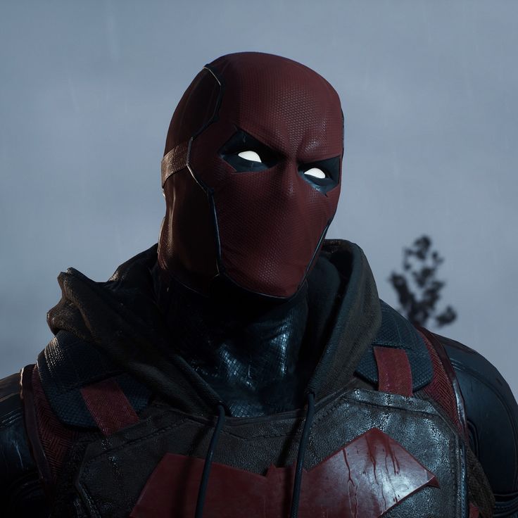 a deadpool character wearing a red and black costume