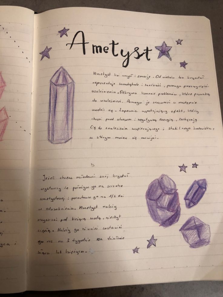 an open book with some drawings on it and writing about amethyst written in cursive ink