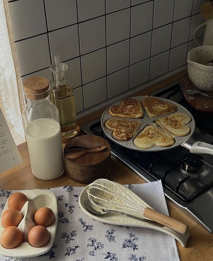 pancakes and eggs on a kitchen counter