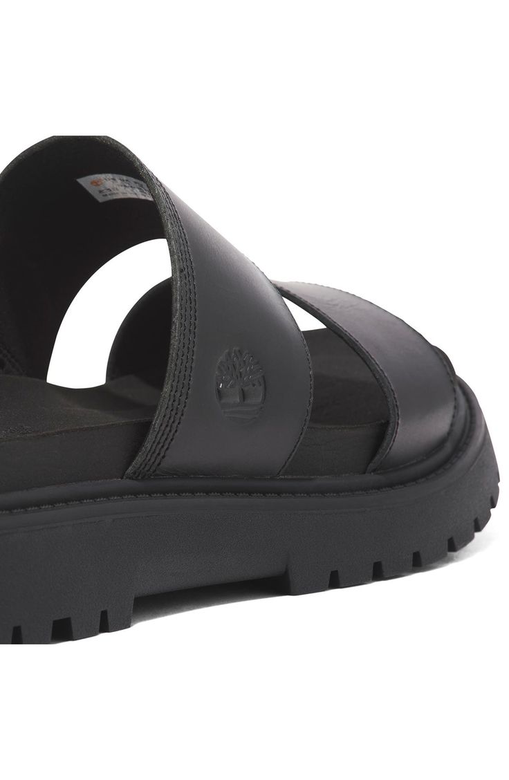 Crafted with responsibly sourced leather, this two-strap slide sandal offers walkable comfort with OrthoLite® cushioning, a faux-suede lining and a lug sole. 1 1/2" heel OrthoLite footbed Leather upper/textile lining/rubber sole Imported Lug Sole, Sandal Women, Strap Sandals, Slide Sandals, Black Sandals, Smooth Leather, Faux Suede, Rubber Sole, Womens Sandals