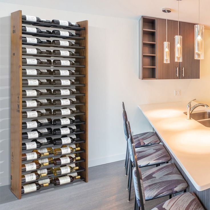 a wine rack in the middle of a kitchen