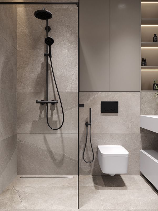 a bathroom with a shower, toilet and sink in it's center wall is illuminated by recessed lighting