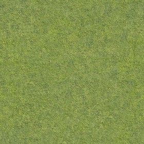 an overhead view of a man on a golf course with his club in the grass