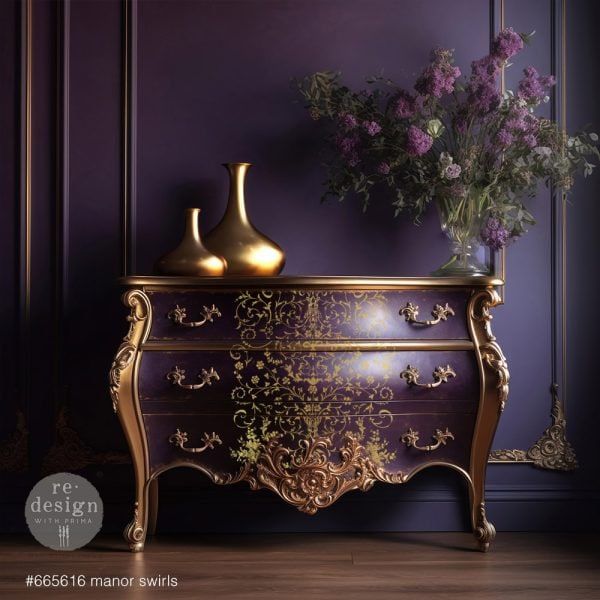 an ornate dresser with two vases and flowers on it in front of a purple wall