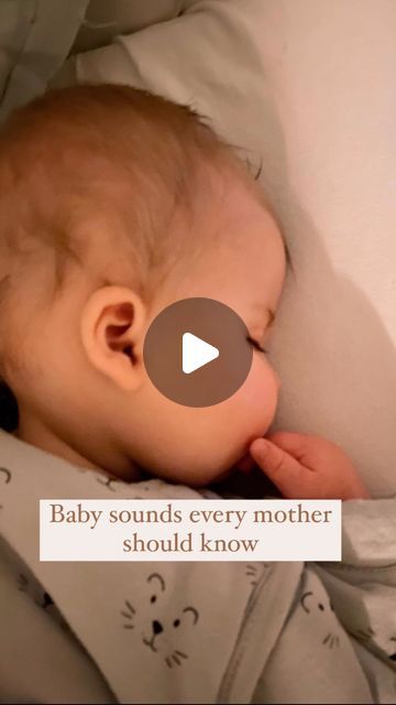 a baby laying in bed with its mouth open and the words baby sounds every mother should know