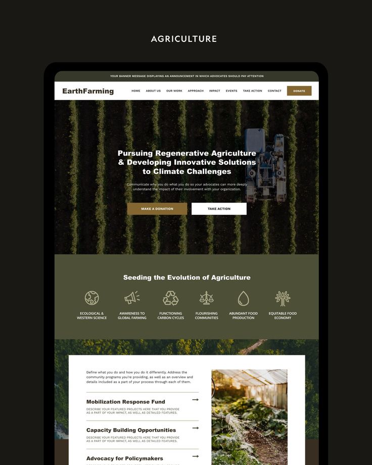 the website for agriculture is displayed on a tabletop, with an image of trees in the background