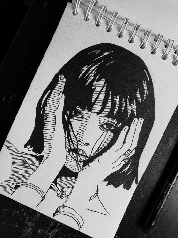 a black and white drawing of a girl with her hand on her head, next to a spiral notebook