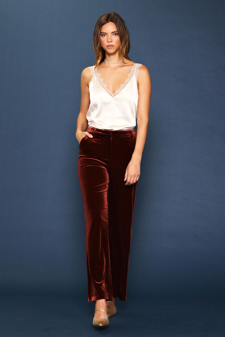 A pair of velvet pants is an opulent choice for getting dressed up in the cooler months. This one's done in a wide-leg silhouette that's polished yet comfortable, elasticized at the back waistband for a precise fit. Go plush from head to toe by adding our velvet blazer on top. •Zip fly •Slant front pockets •Wide-leg silhouette •Elasticized back waistband •Welted back pockets Item Number: 73389A Velvet Pants Outfit, Velvet Wide Leg Pants, Blue Floral Sundress, Derby Fascinator, Straight Fit Pants, Velvet Trousers, Fun Pants, Getting Dressed, Floral Sundress