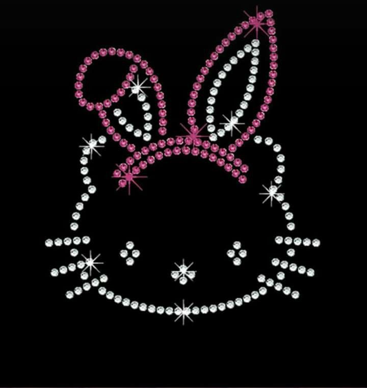 a black background with pink and white bunny ears on it's head, surrounded by diamonds