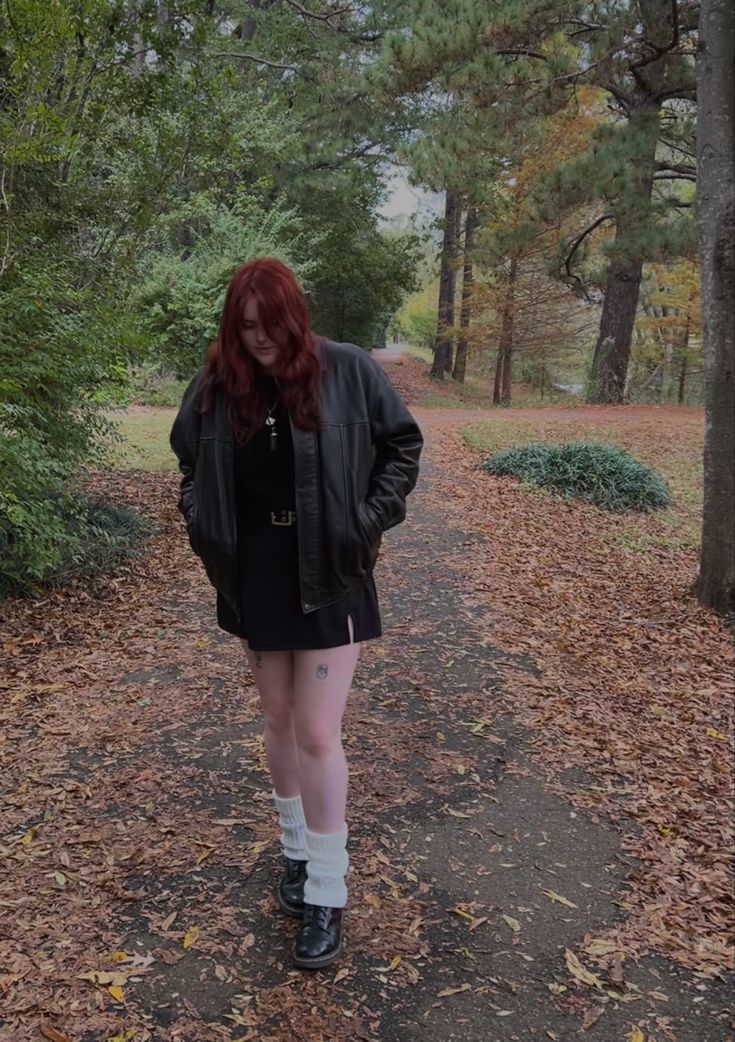 oversized thrifted brown leather jacket cider miniskirt and thrifted sweater. leg warmers over doc martens and also tattoos , fall leaves, dark red hair Dark Red Doc Martens Outfit, Oversized Jacket Outfit, Fall Ootd, Dark Red Hair, Red Converse, Girls With Red Hair, Hair Wear, Oversized Jacket, Brown Leather Jacket